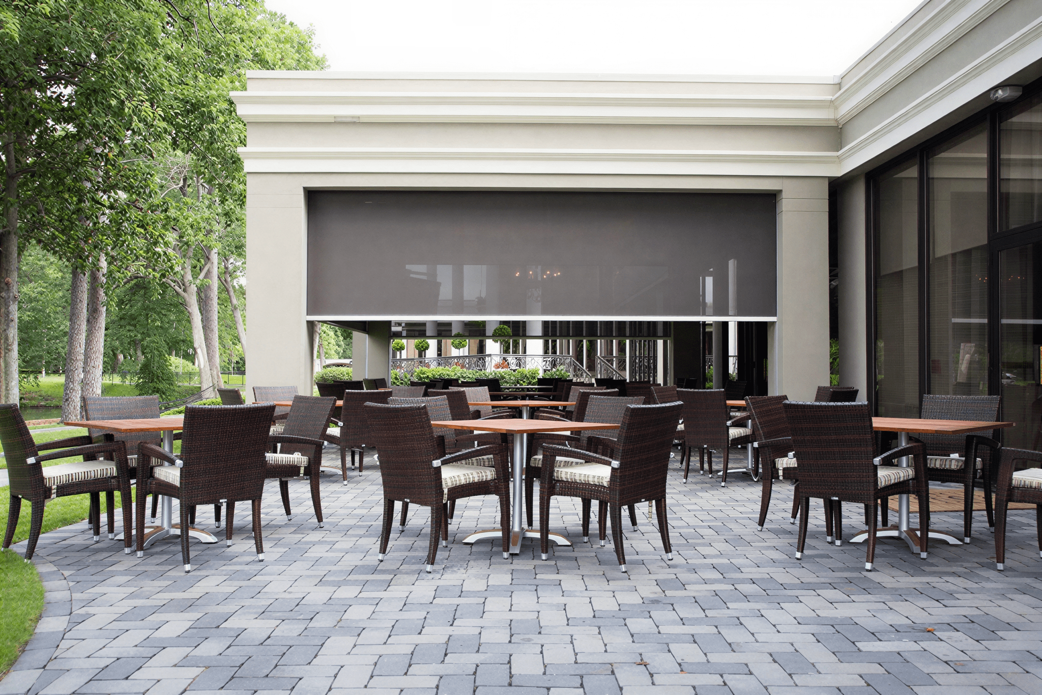 Spacious patio seating in a garden setting.