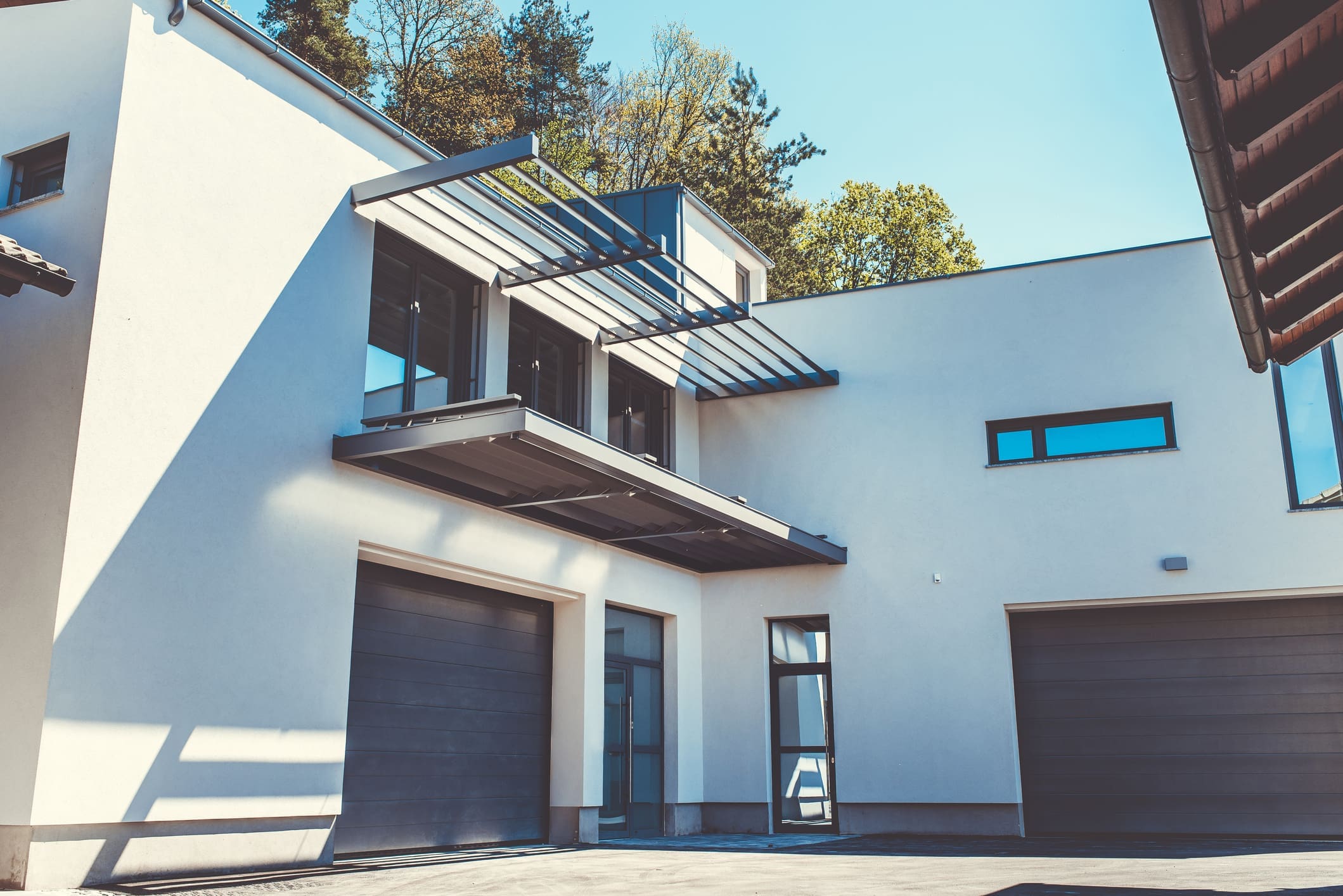 Modern house with large rolling garage Shutters in Sacramento.