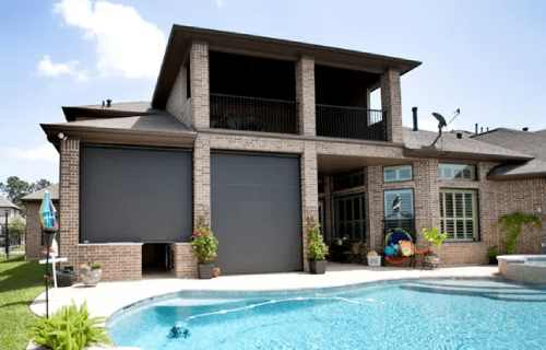 Brick home with outdoor pool area