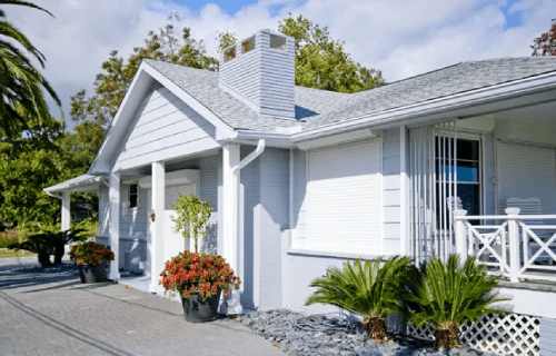 White bungalow with garden