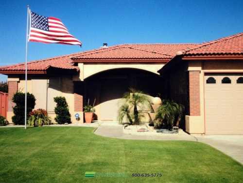 House front yard with flag waving